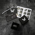 Charger l'image dans la galerie, Bague tête de mort entourée en titane et acier inoxydable